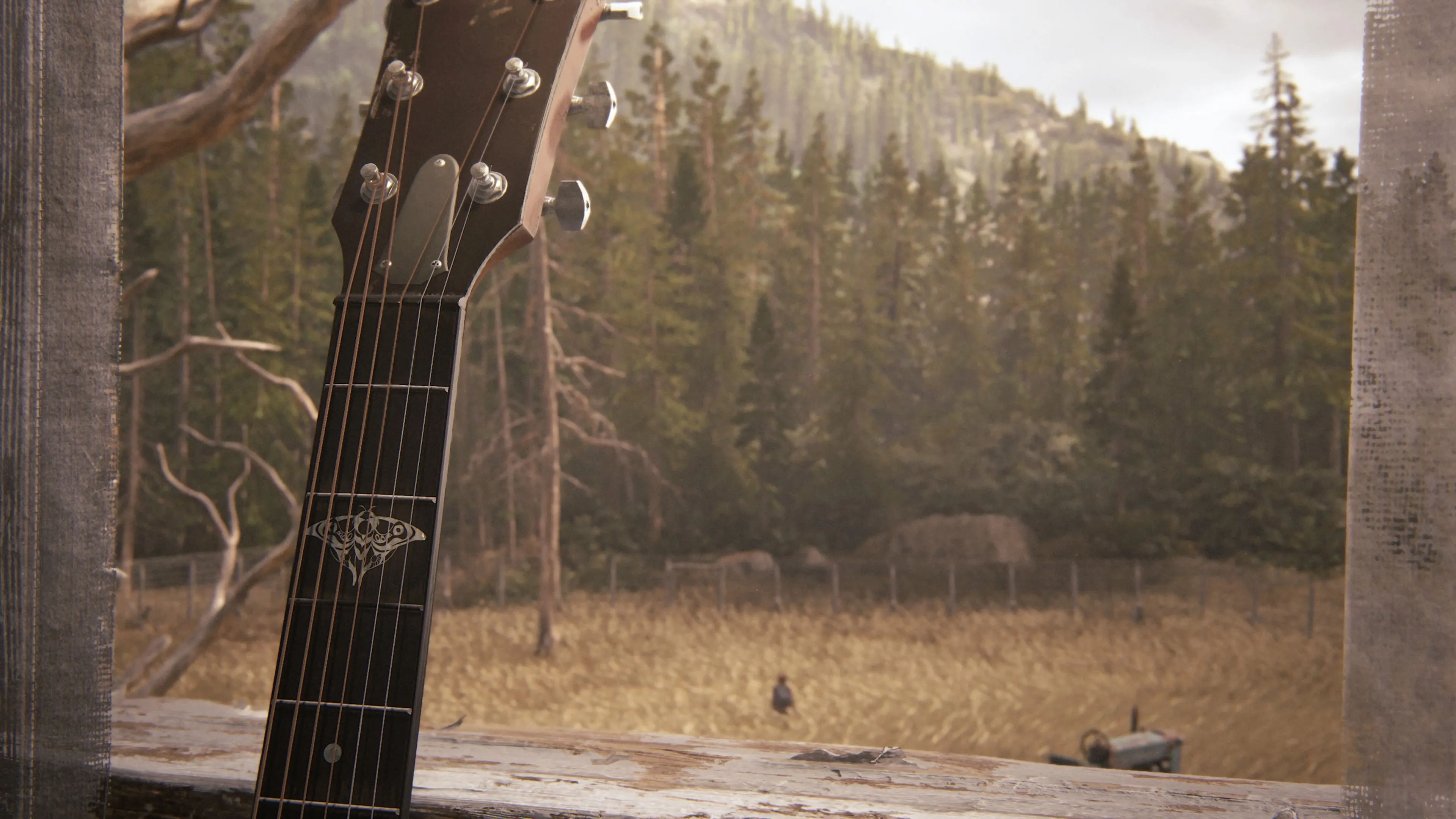 A guitar with a firefly engraved while in the background can see Ellie walking away